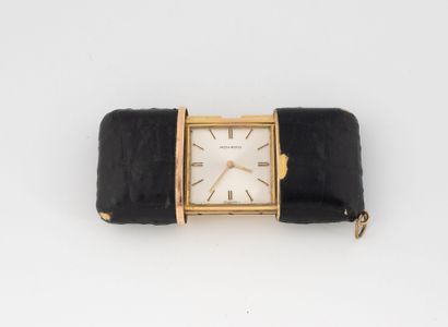 MOVADO
Small travel clock with sliding winding...