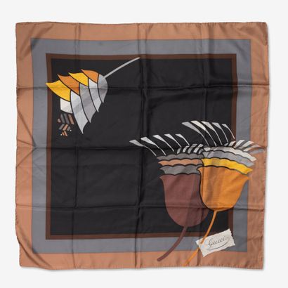 GUCCI et CARTIER
Lot of two scarves including...
