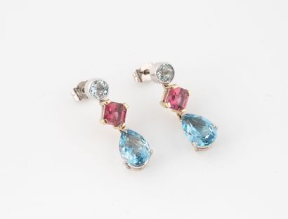 Pair of earrings in yellow and white gold...