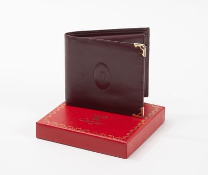 Must de CARTIER
Burgundy leather and gilt...
