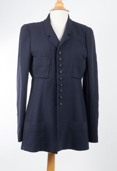 Chanel Boutique.
Navy blue button-down jacket...