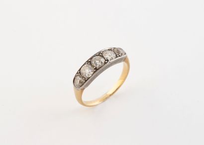 Yellow gold (750) and platinum (850) ring...