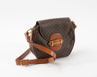 CELINE
Beige canvas and printed bag on natural...