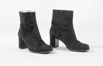 CHANEL 
Black suede ankle boots with black...