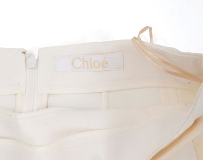 CHLOE
Over-the-knee ecru trapeze skirt with...