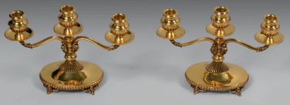Paire de bouts de table en vermeil à trois...