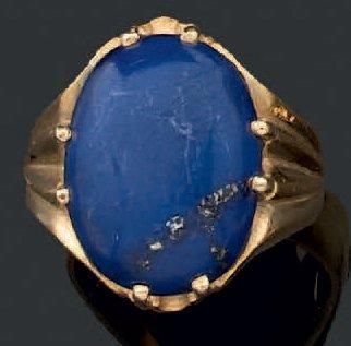 Bague chevalière en or, ornée d'un cabochon...