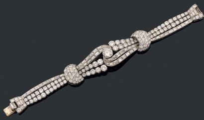 Élégant bracelet articulé en platine, orné...