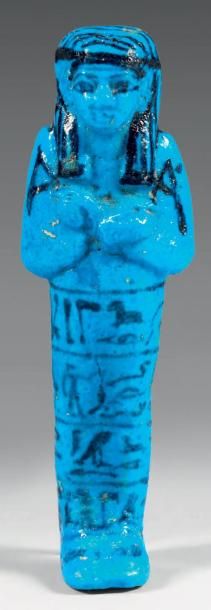 Oushebti. Faïence bleue intense, avec inscription...