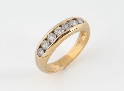 Wedding band in yellow gold (750) set with...