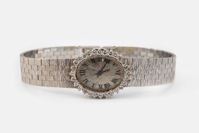 Ladies' watch in white gold (750), oval case.
Bezel...
