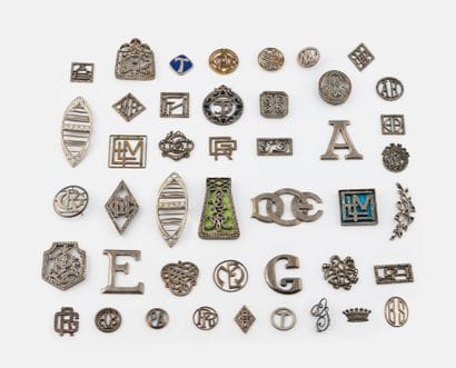 Lots of silver-plated leather goods plates...
