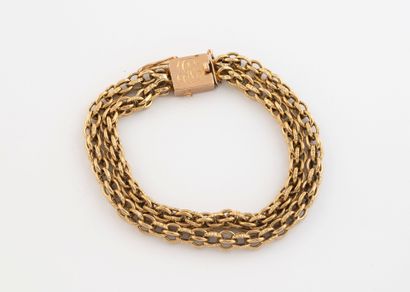 Yellow gold (750) double jaseron link bracelet.
Ratchet...