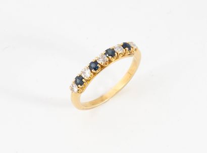 Half wedding band in yellow gold (750) set...