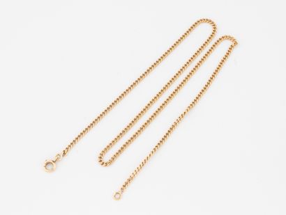 Yellow gold (750) curb chain. 
Spring-ring...