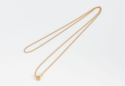 Yellow gold (750) curb chain.
Spring-ring...