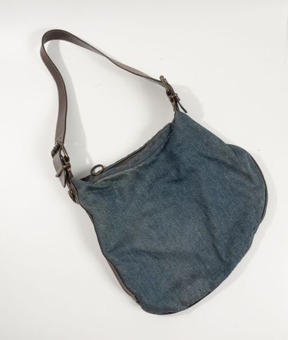 FENDI
Jean canvas and brown leather half-moon...