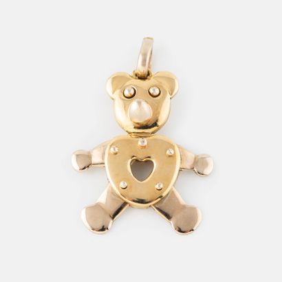 Yellow gold (750) pendant featuring a bear,...