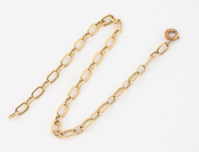 Small yellow gold (750) figaro link bracelet.
Spring-ring...