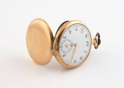 Pocket watch in pink gold (585).
White enameled...