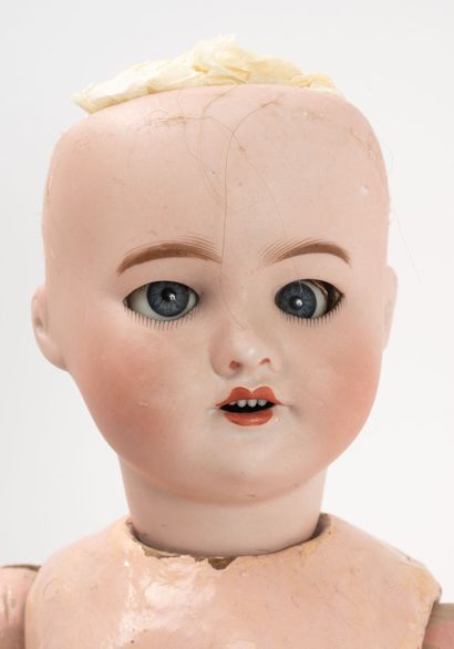 SFBJ
Walking doll, porcelain head, marked...
