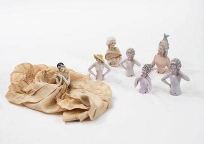 7 enameled porcelain female half-figures,...