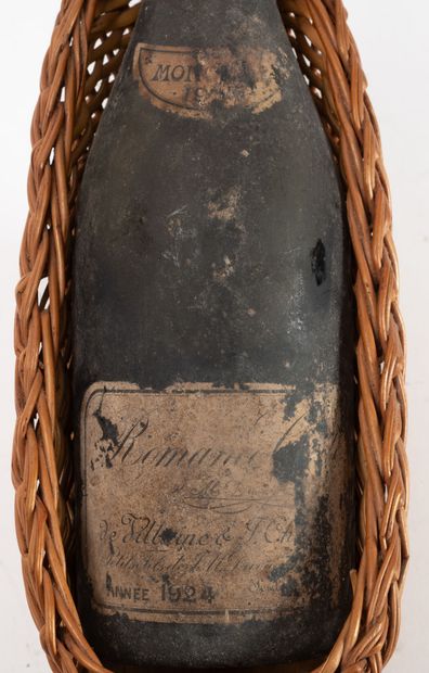 ROMANEE-CONTI
1 bouteille, 1924.
Niveau vidange.
Rayures,...