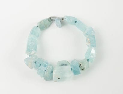 LYNGGARD MONIES
Large necklace holding eroded...