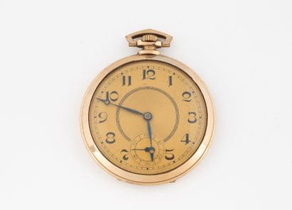 Gilt metal pocket watch.
Dial with partially...