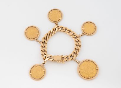 Yellow gold (750) curb chain bracelet adorned...