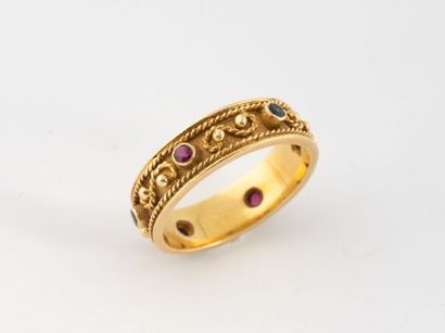 Yellow gold (750) band ring set with faceted...