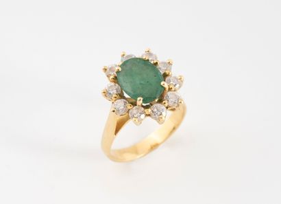 Yellow gold (750) daisy ring centered on...