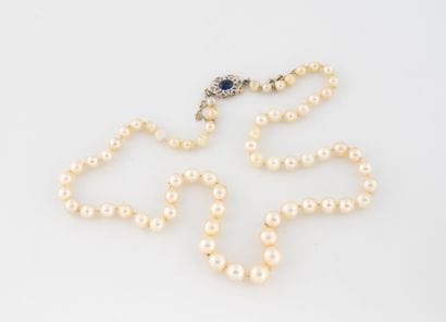 Necklace of falling white cultured pearls....