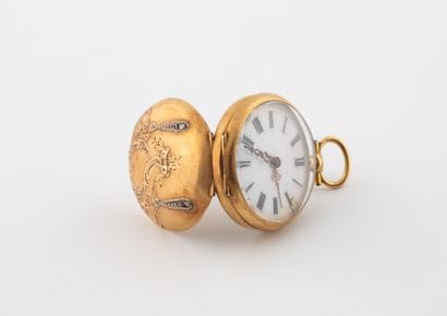Small neckwatch in yellow gold (750) with...