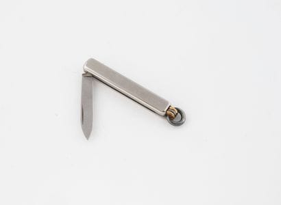 MUST Cartier 
Small pocket knife signed Cartier...