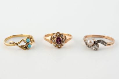 Lot of three yellow gold (750) rings including...