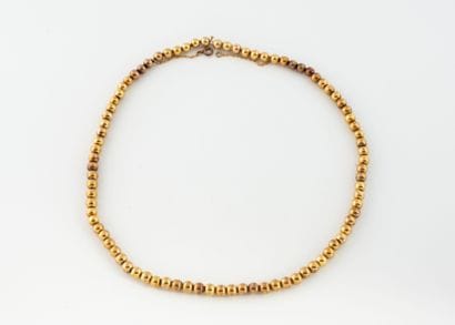 Necklace in yellow gold (585) adorned with...