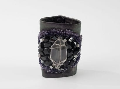 SWAROVSKY
Satin-finish purple leather cuff...