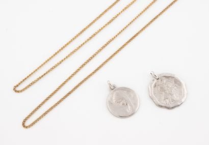Lot of two round religious medals in silver...