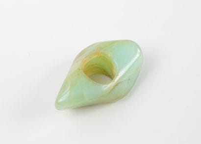 Fancy ring set in a brown-veined green ornamental...