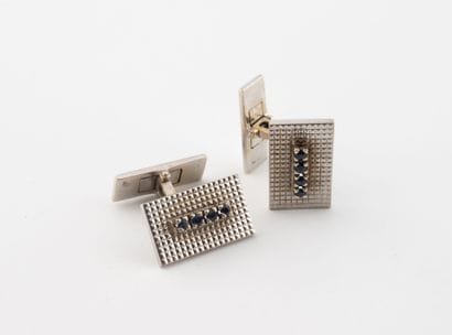Pair of claw-set white gold (750) and sapphire...