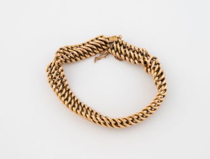 American link bracelet in yellow gold (750).
Ratchet...