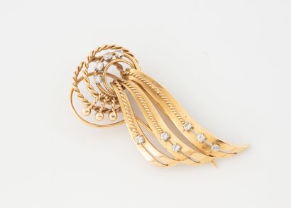 Yellow gold (750) and platinum clip forming...