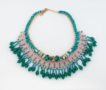 TERIA YABAR
Necklace featuring a gilded metal...