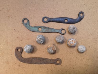 Two rectangular lead sinkers, one with a...