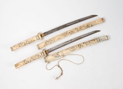 JAPAN, early 20th century
Two katana. 
Handles,...