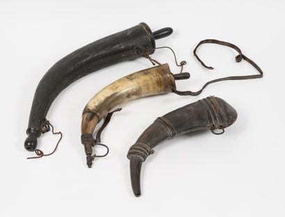 Three 19th century powder flasks:
- a large...