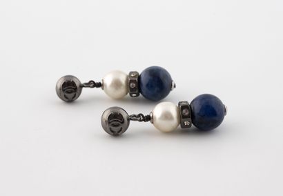 CHANEL 
Pair of metal earrings, adorned with...