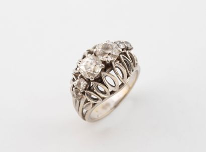 A white gold (750) and platinum (850) ring...
