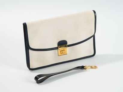 CELINE
Petite pochette en toile crème et...